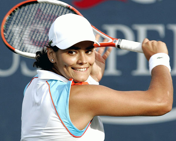 Eleni Daniilidou  hits a return to Na Li of China at the US Open tennis tournament in New York, Thursday, Aug. 31, 2006