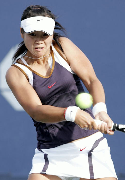 Na Li of China hits a return to Eleni Daniilidou of Greece at the US Open tennis tournament in New York, Thursday, Aug. 31, 2006