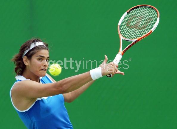 Eleni Daniilidou of Greece hits a backhand in her first round match against Patty Schnyder of Switzerland during day two of the Australian Open at Melbourne Park January 17, 2006 in Melbourne, Australia. (Photo by Mark Nolan/Getty Images) 