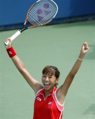 Shinobu Asagoe, of Japan, celebrates her 7-6, 4-6, 6-3 victory over Eleni Daniilidou, of Greece, at the U.S. Open tennis tournament in New York,  Monday, Sept. 6, 2004.   (AP Photo/Greg Bull)