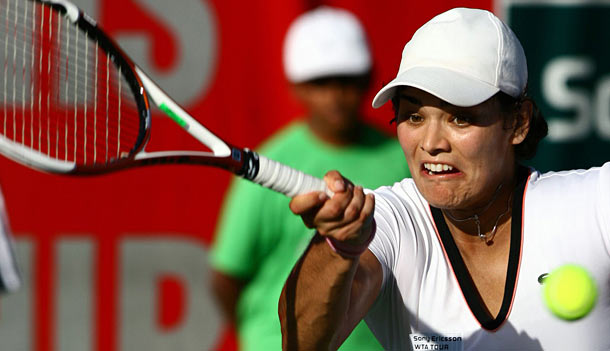 Eleni Daniilidou of Greece returns the ball to Ai Sugiyama from Japan during the third day of Dubai Duty Free Women's Open in Dubai, United Arab Emirates, Wednesday Feb. 21, 2007. Eleni Daniilidou won 7-5, 1-6, 5-7