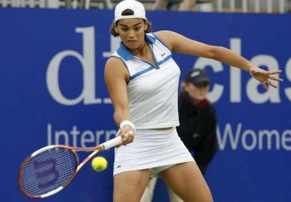 Eleni Daniilidou  hits a return against Britain's Anne Keothavong during the Birmingham Classic tennis tournament in Edgbaston, central England , June 14, 2006. Daniilidou won the match 6-3, 6-0.