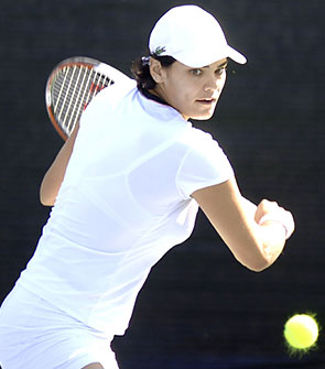 Eleni Daniilidou of Greece returns the ball to Ai Sugiyama from Japan during the third day of Dubai Duty Free Women's Open in Dubai, United Arab Emirates, Wednesday Feb. 21, 2007. Eleni Daniilidou won 7-5, 1-6, 5-7