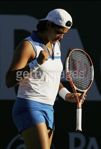 Eleni Daniilidou celebrates winning a point during her first round match win over Maria Elena Camerin of Italy at the Pacific Life Open tennis tournament in Indian Wells, California, March 8, 2006