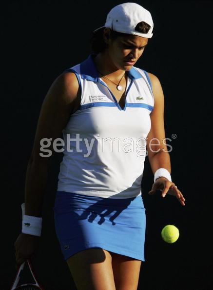 Eleni Daniilidou on the service against Maria Elena Camerin of Italy during her first round match at the Pacific Life Open tennis tournament in Indian Wells, California, March 8, 2006