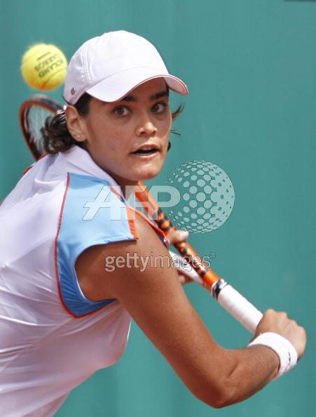 Eleni Daniilidou from Greece hits a return to Japanese Ai Sugiyama during the French Open at Roland Garros in Paris 28 May 2006