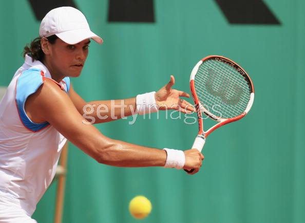 Eleni Daniilidou from Greece hits a return to Japanese Ai Sugiyama during the French Open at Roland Garros in Paris 28 May 2006