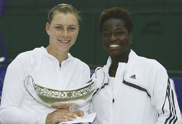 Vera Zvonareva of Russia holds the Maud Watson trophy as she poses with losing finalist Jamea Jackson of the USA after the final of the DFS Classic at Edgbaston on June 18, 2006 in Birmingham, England