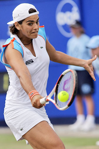 Eleni Daniilidou returns a shot to Dinara Safina of Russia during the semi-finals of the Ordina Open tennis tournament in the Dutch town of Rosmalen June 23, 2006. Eleni lost 3-6, 6-3, 4-6.