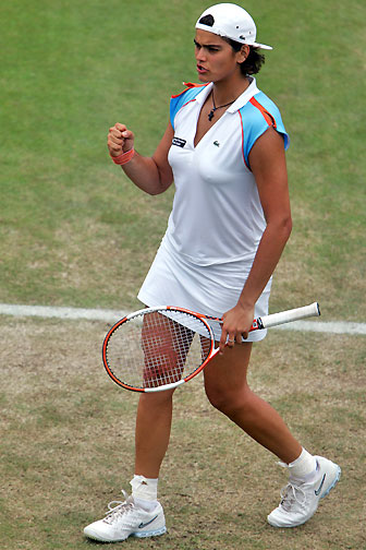 Eleni Daniilidou celebrates a winning a point against  Dinara Safina of Russia during the semi-finals of the Ordina Open tennis tournament in the Dutch town of Rosmalen June 23, 2006. Eleni lost 3-6, 6-3, 4-6.