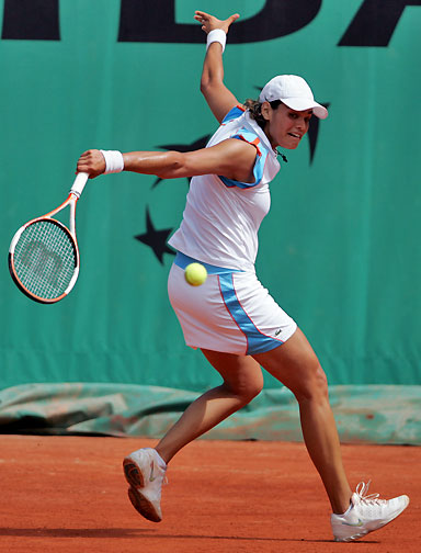 Eleni Daniilidou from Greece hits a return to Japanese Ai Sugiyama during the French Open at Roland Garros in Paris 28 May 2006