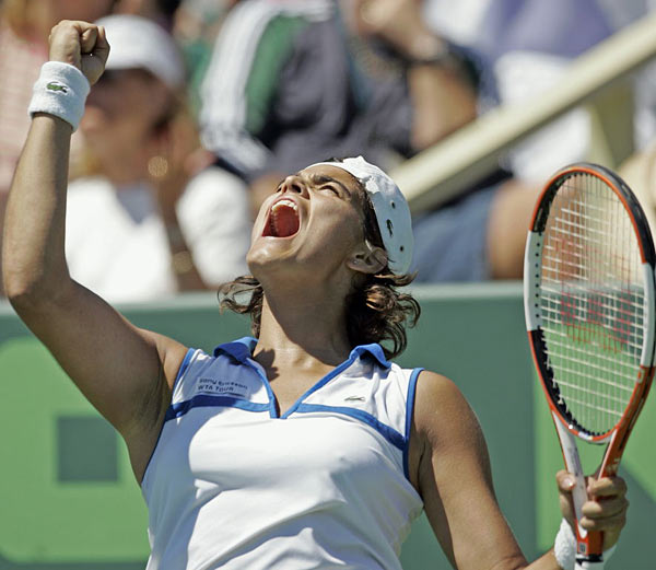 Eleni Daniilidou celebrates after defeating 6-3, 4-6, 6-2 Daniela Hantuchova at the Nasdaq-100 Open tennis tournament Sunday, March 26, 2006 in Key Biscayne,