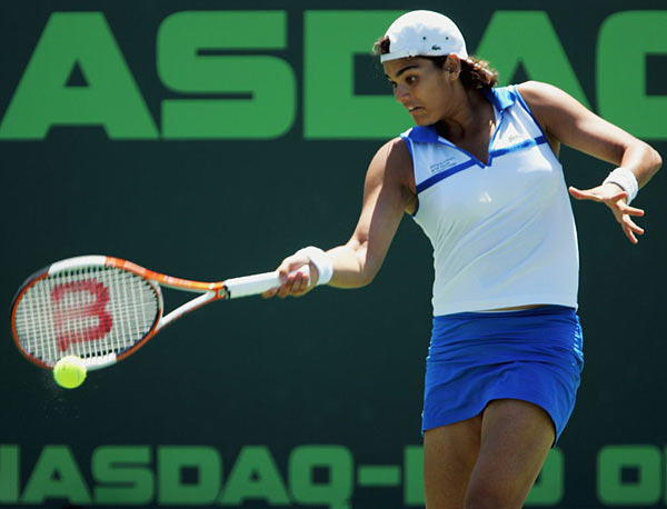 Eleni Daniilidou of Greece returns a shot to Daniela Hantuchova of Slovakia during the Nasdaq-100 Open, part of the Sony Ericsson WTA Tour, at the Tennis Center at Crandon Park on March 26, 2006 in Miami, Florida. Daniilidou won the match 6-3, 4-6, 6-2