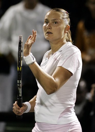 Nadia Petrova of Russia acknowledges the crowd after defeating Eleni Daniilidou of Greece 6-2, 6-0 at the Nasdaq-100 Open tennis tournament Monday, March 27, 2006 in Key Biscayne