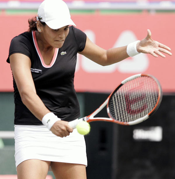 Eleni Danilidou returns a shot to Japan's Ai Sugiyama on her way to winning their final match of the Korea Open tennis tournament at Olympics Park in Seoul, South Korea, Sunday, Oct. 1 2006. Danilidou won the match 6-3, 2-6, 7-6