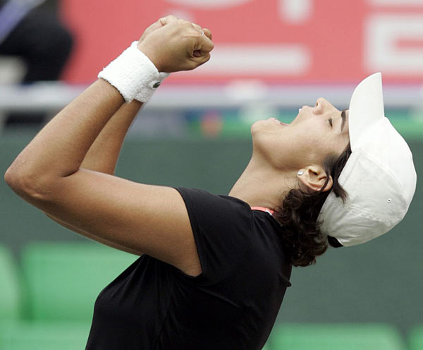 Eleni Danilidou reacts after winning over Japan's Ai Sugiyama during their final match of the Korea Open tennis tournament at Olympics Park in Seoul, South Korea, Sunday, Oct. 1 2006. Danilidou won the match 6-3, 2-6, 7-6