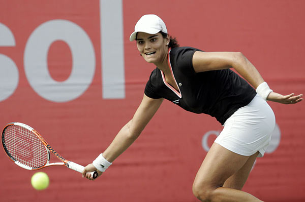 Eleni Danilidou returns a shot to Japan's Ai Sugiyama on her way to winning their final match of the Korea Open tennis tournament at Olympics Park in Seoul, South Korea, Sunday, Oct. 1 2006. Danilidou won the match 6-3, 2-6, 7-6