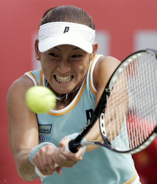 Japan's Ai Sugiyama returns a shot to Greece's Eleni Daniilidou during their final match at the Hansol Korea Open tennis championships in Seoul October 1