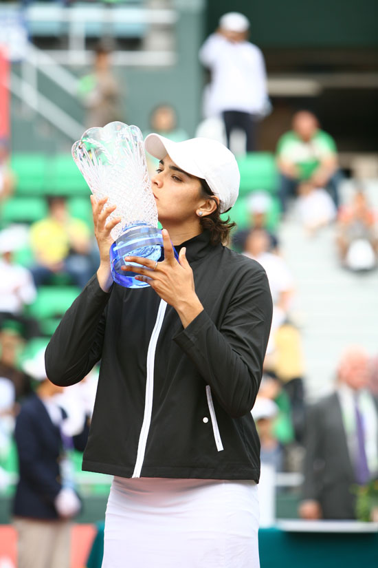 Eleni Daniilidou kisses her trophy after defeating Japan's Ai Sugiyama in their final match at the Hansol Korea Open tennis championships in Seoul on October 1, 2006.