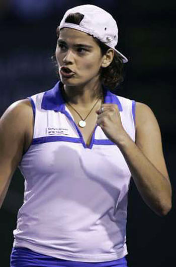 Eleni Daniilidou celebrates winning a point during her first round match win over Maria Elena Camerin of Italy at the Pacific Life Open tennis tournament in Indian Wells, California, March 8, 2006