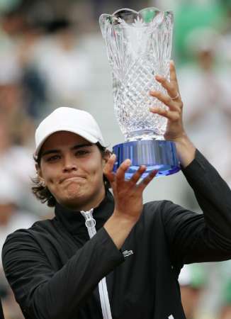 Eleni Daniilidou holds up the trophy after defeating Japan's Ai Sugiyama in their final match at the Hansol Korea Open tennis championships in Seoul on October 1, 2006