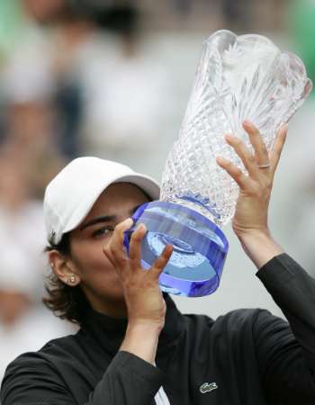 Eleni Daniilidou kisses her trophy after defeating Japan's Ai Sugiyama in their final match at the Hansol Korea Open tennis championships in Seoul on October 1, 2006.